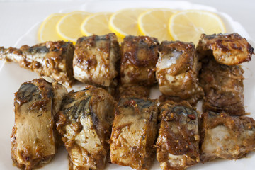 Marinated mackerel slices baked on the grill