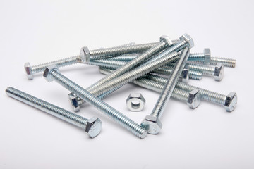 Bolt and nuts on a white background