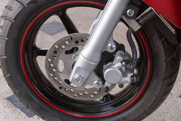 Obraz na płótnie Canvas Front wheel of a sports motorcycle