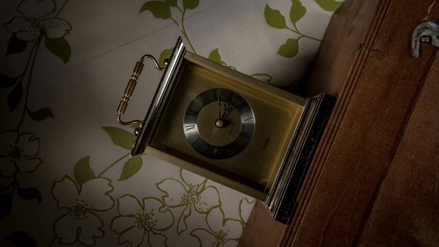 Time lapse clock - camera rotates with big hand of a clock from 03:00-04:00