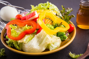 close up,.Salad healthy food on black stone background. .Weight loss.