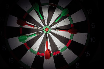 darts arrows in the target center. Smart goal setting, dart hit the center of dartboard. Hit to the...