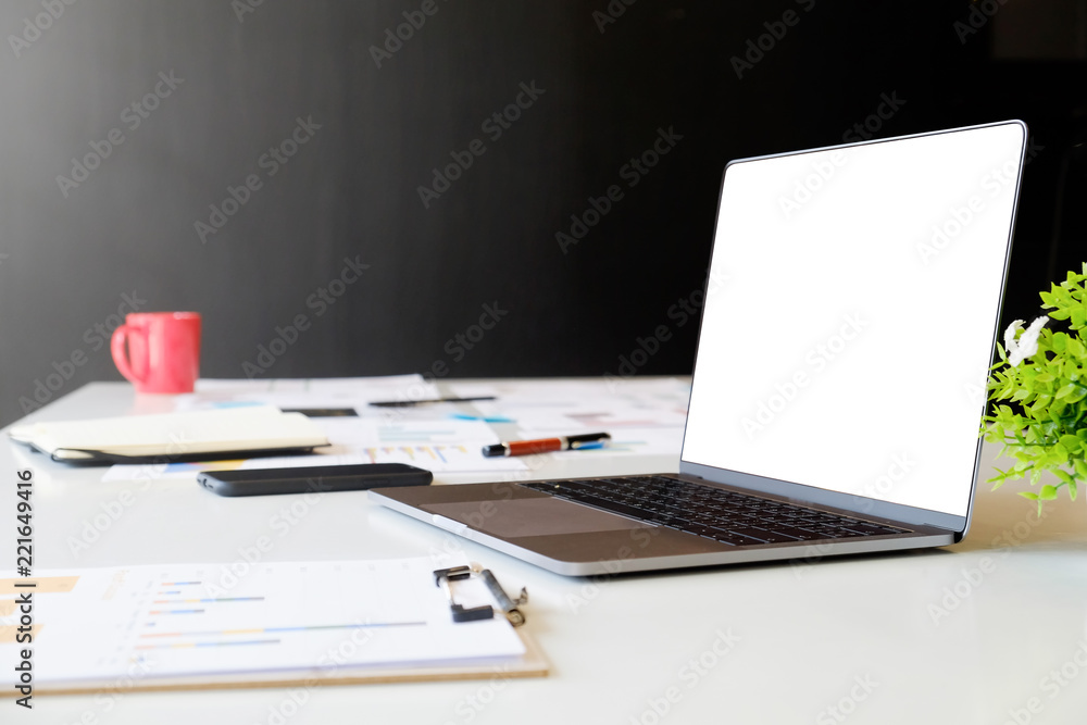 Poster business workplace with mockup laptop computer and business data paper on desk work.