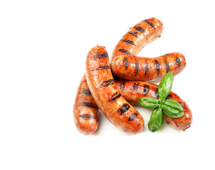 grilled sausages on white background
