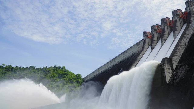 Dam water release. Water overflows during the rainy season. Khun Dan Prakan Chon dam in thailand. 4k