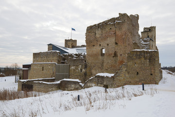 Ruins of the medieval castle of the Livonian knight's order in the gloomy March day. Rakvere, Estonia