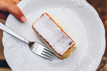 Close up of mille-feuille napoleon pastry on white plate