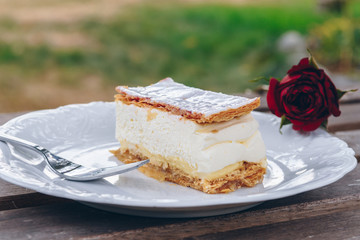 Close up of mille-feuille napoleon pastry on white plate