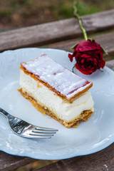 Close up of mille-feuille napoleon pastry on white plate