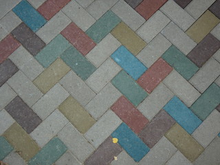 Surface of multi-colored paving slabs