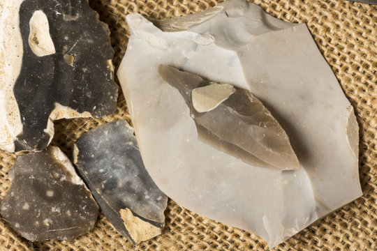  an arrowhead made from flintstone close up - experimental archeology
