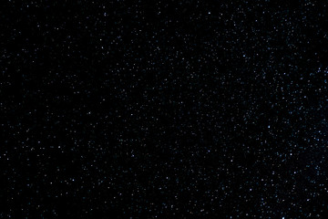 Naklejka premium Stars texture on the dark sky.