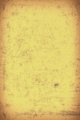 The texture of old yellow paper. Abstract grunge background