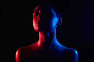 Fototapeta premium woman silhouette in color bright lights