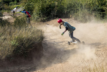 Riders during downhill on mountainboard championship