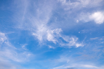 Naklejka na ściany i meble Blue sky clouds background. Beautiful white cloud on blue sky background