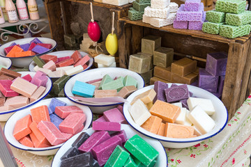 Natural soap on the counter of the city sunday market in Parma Italy