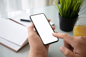 man hands holding phone with isolated screen in office