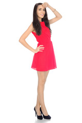 Woman in red short dress and heels