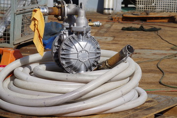Transfer pump on a vessel deck. Pump used in tank cleaning. - obrazy, fototapety, plakaty