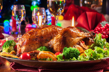 Baked or roasted whole chicken on Christmas table © Sławomir Fajer