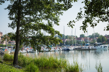 Marina and pier on Rynskie lake, town of Ryn.