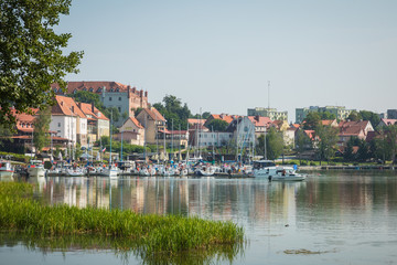 Marina and pier on Rynskie lake, town of Ryn.