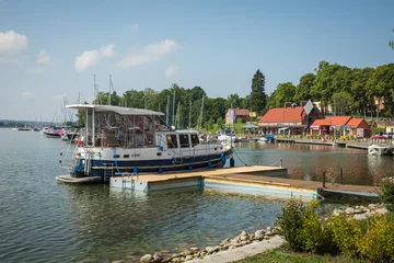 Zelfklevend Fotobehang Marina and pier on Rynskie lake, town of Ryn. © Curioso.Photography