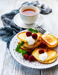 Delicious pancakes with raspberries
