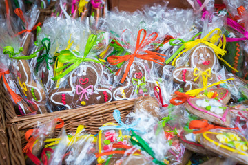 Naklejka premium Souvenir gingerbread of different shapes on one of the traditional market in Cracow, Poland.