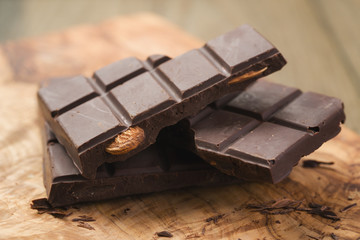 Closeup homemade dark chocolate with almonds