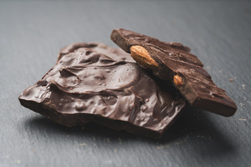 Closeup homemade dark chocolate with almonds