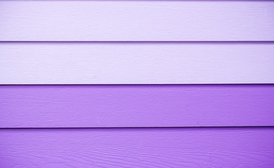 Wood purple background.Purple Synthetic wood wall texture use for background.Colorful wooden board painted in purple. Wood background