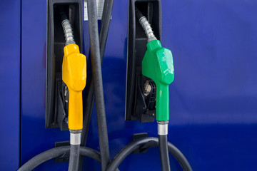 Fuel Pump, Gas Station, Gasoline.Colorful Petrol pump filling nozzles isolated on white background...