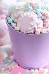 Violet pail with various marshmallows.