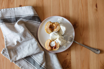  Delicious breakfast in a rustic style. Snack from apples. Baked apples with creamy ice cream