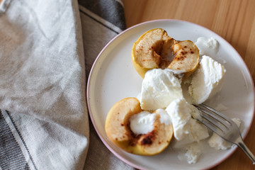  A delicious breakfast: a baked apple with honey and cinnamon and a vanilla ice cream ball. Useful and tasty breakfast. Screensaver for the blog about food