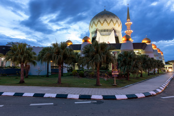 Sabah State Mosque Islamic Muslim religious dome building at dawn.