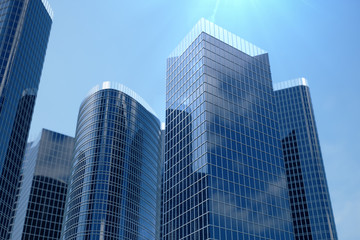 Naklejka na ściany i meble 3D Illustration blue skyscrapers from a low angle view. Architecture glass high buildings. Blue skyscrapers in a finance district