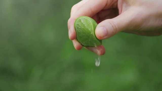 Lime squeezed in slow motion