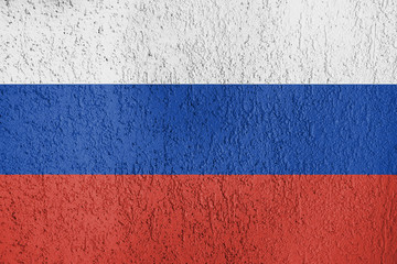 The texture of the flag of Russia on the wall of plaster.