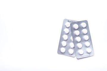 Medicine green and yellow pills or capsules