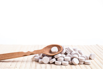 Medicine green and yellow pills or capsules