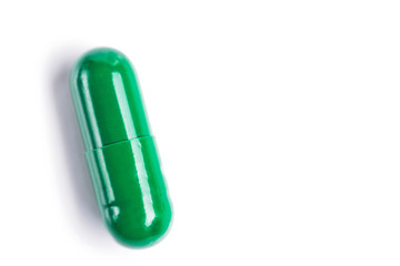 Medicine green and yellow pills or capsules