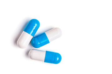 Medicine green and yellow pills or capsules