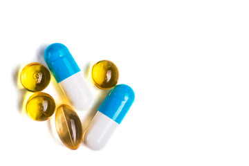 Medicine green and yellow pills or capsules