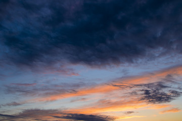 Naklejka na ściany i meble Beautiful clouds at sunset, abstract nature background