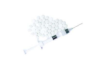 Medicine pills or capsules with syringe