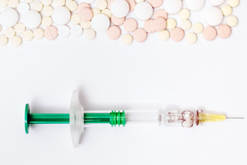 Medicine pills or capsules with syringe