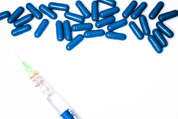 Medicine pills or capsules with syringe